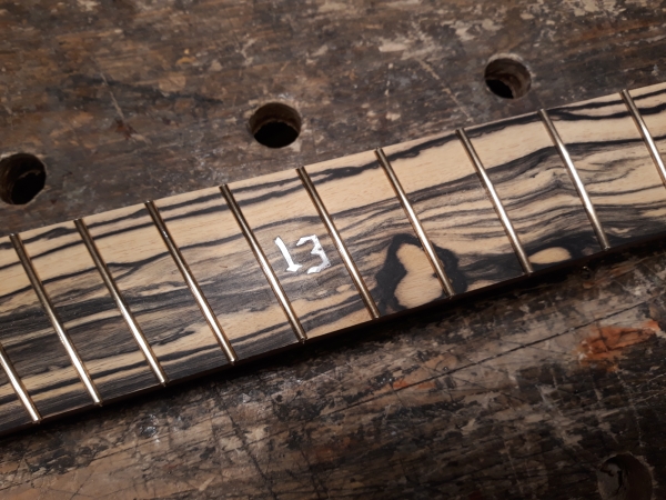 white ebony fretboard